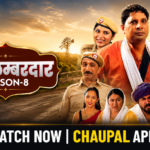 Promotional poster for Tuchacha Lambardar Season 8, a Haryanvi comedy-drama series streaming on Chaupal OTT, featuring Deen Bandhu Yadav and the ensemble cast against a rural village backdrop. The poster highlights village life, family relationships, humor, and community-driven storytelling.
